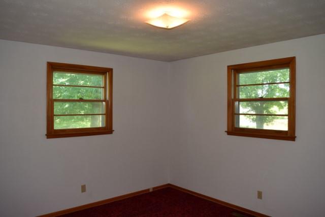116 Black Road Dickson, TN 37055 - Photo 19 of 21 an empty room with a window