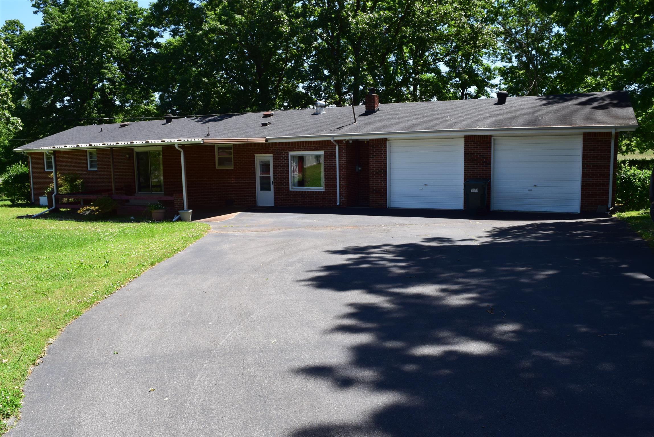 116 Black Road Dickson, TN 37055 - Photo 3 of 21 a front view of a house with a yard