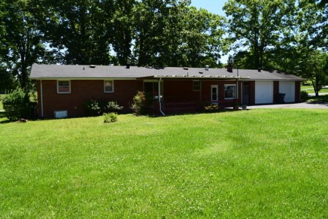 116 Black Road Dickson, TN 37055 - Photo 4 of 21 a front view of house with yard and trees