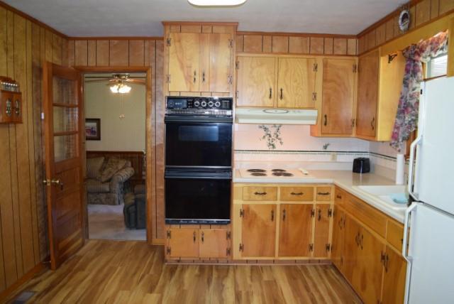 116 Black Road Dickson, TN 37055 - Photo 7 of 21 a kitchen with a refrigerator and a stove