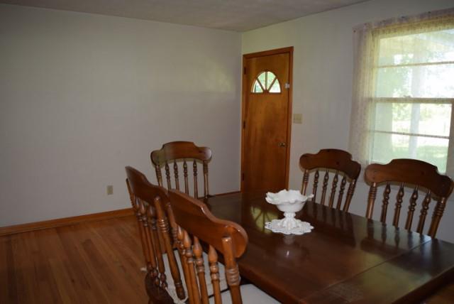 116 Black Road Dickson, TN 37055 - Photo 9 of 21 a view of a dining room with furniture window and wooden floor