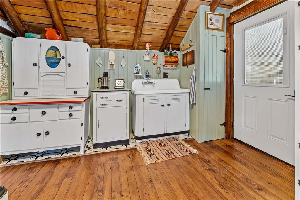 124 New Beaver Creek Road Markleysburg, PA 15459 - Photo 21 of 31 a room with storage and utility