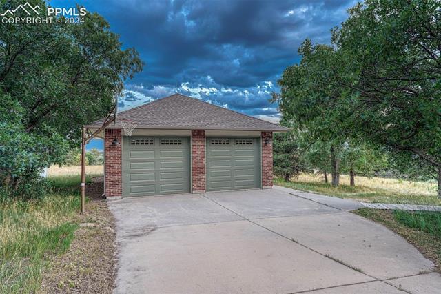 14645 Sterling Road Colorado Springs, CO 80921 - Photo 41 of 49 2 car detached garage with plenty of room for a workshop