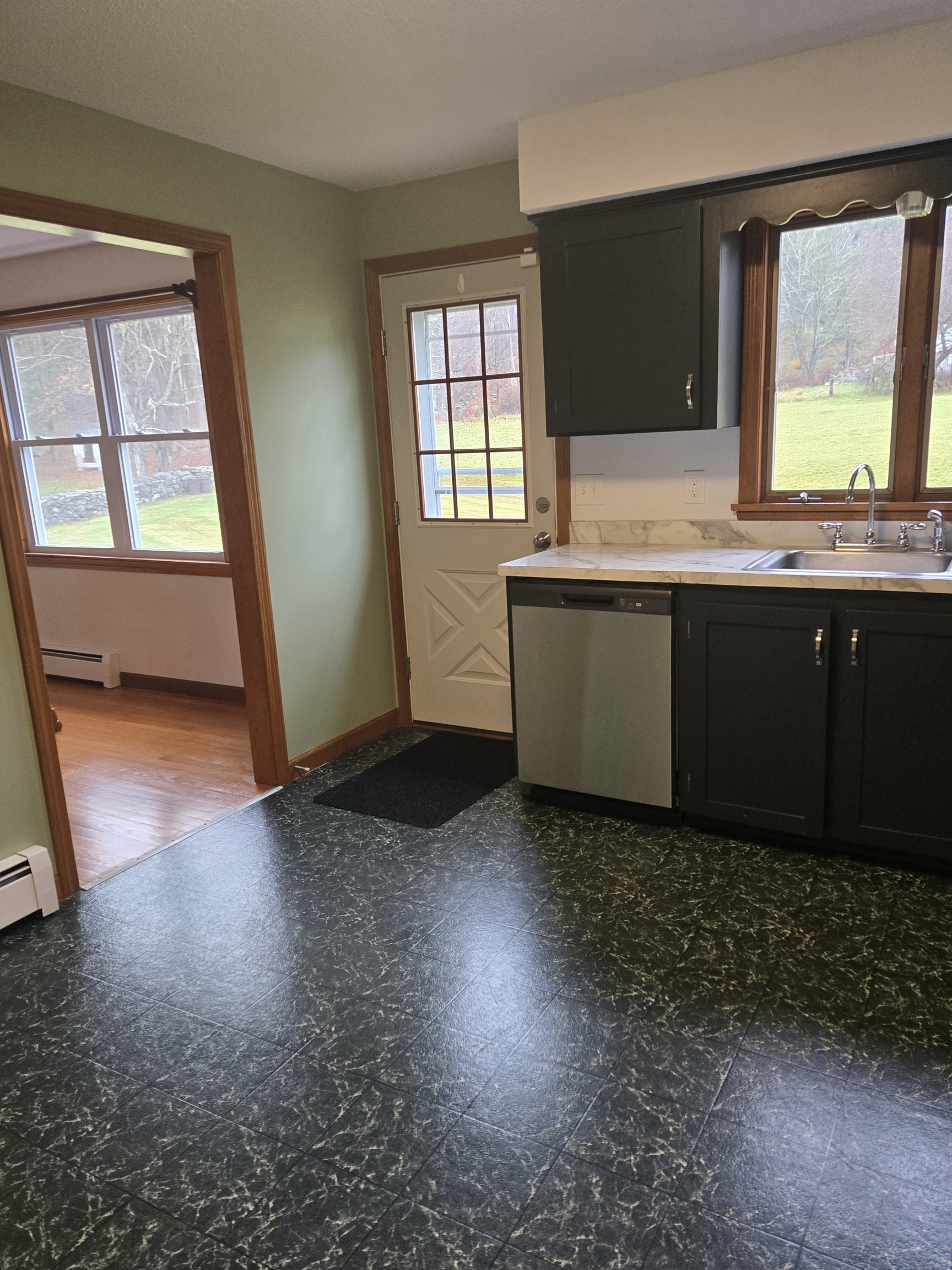 48 River Road Mansfield, CT 06250 - Photo 12 of 27 wooden floor in an empty room with a window and wooden floor