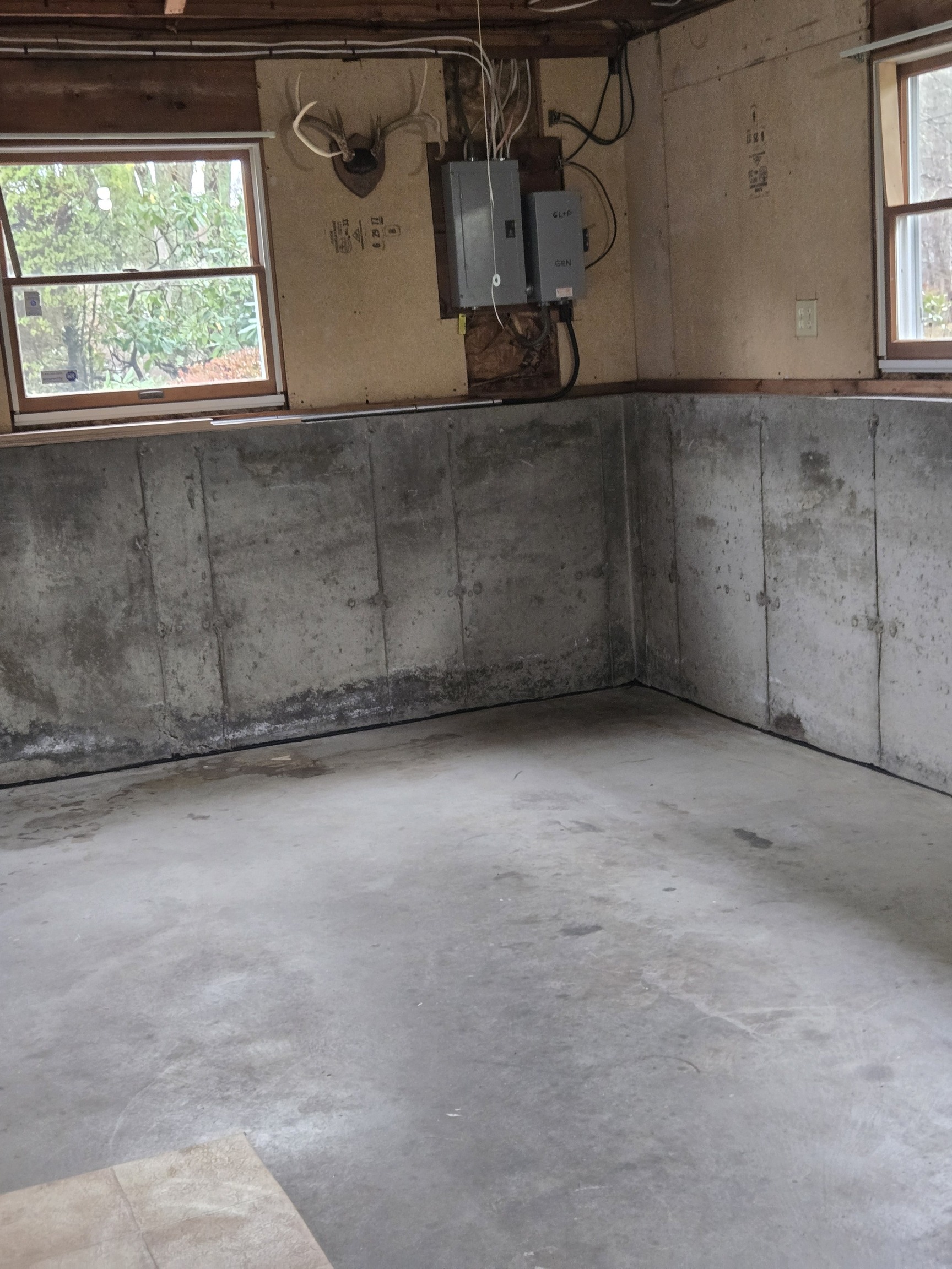 48 River Road Mansfield, CT 06250 - Photo 24 of 27 a view of a room with rack on the wall and a window