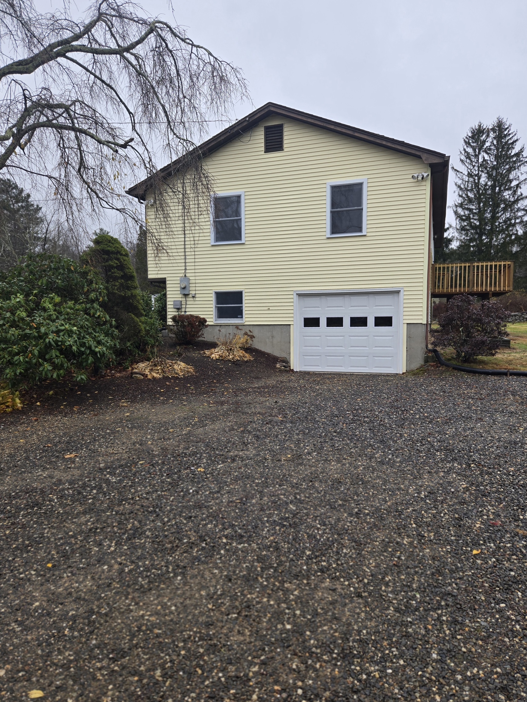 48 River Road Mansfield, CT 06250 - Photo 3 of 27 a house view with a backyard space
