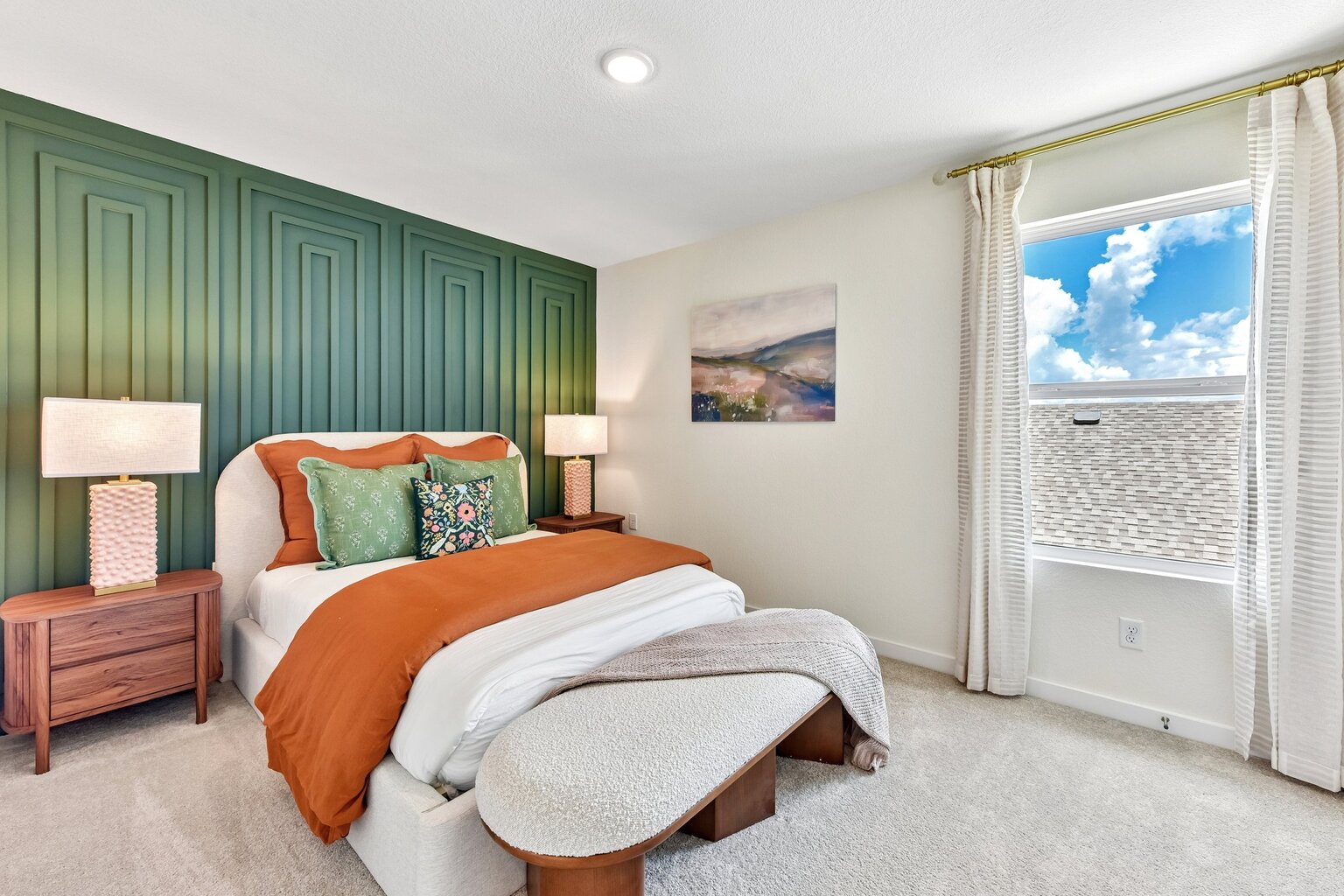 10609 Trifecta Way Buda, TX 78610 - Photo 11 of 17 A feature wall with geometric paneling adds character to this serene bedroom.