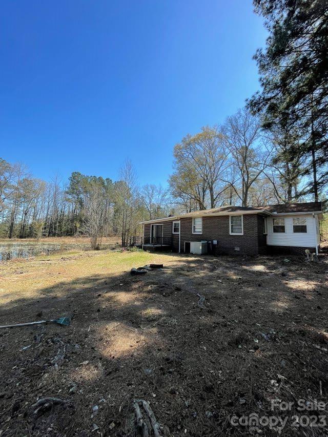 3240 Sam Jones Road Patrick, SC 29584 - Photo 13 of 35 a front view of a house with a yard