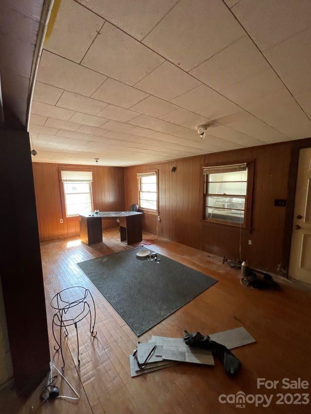 3240 Sam Jones Road Patrick, SC 29584 - Photo 32 of 35 a room with pool table windows and wooden floor