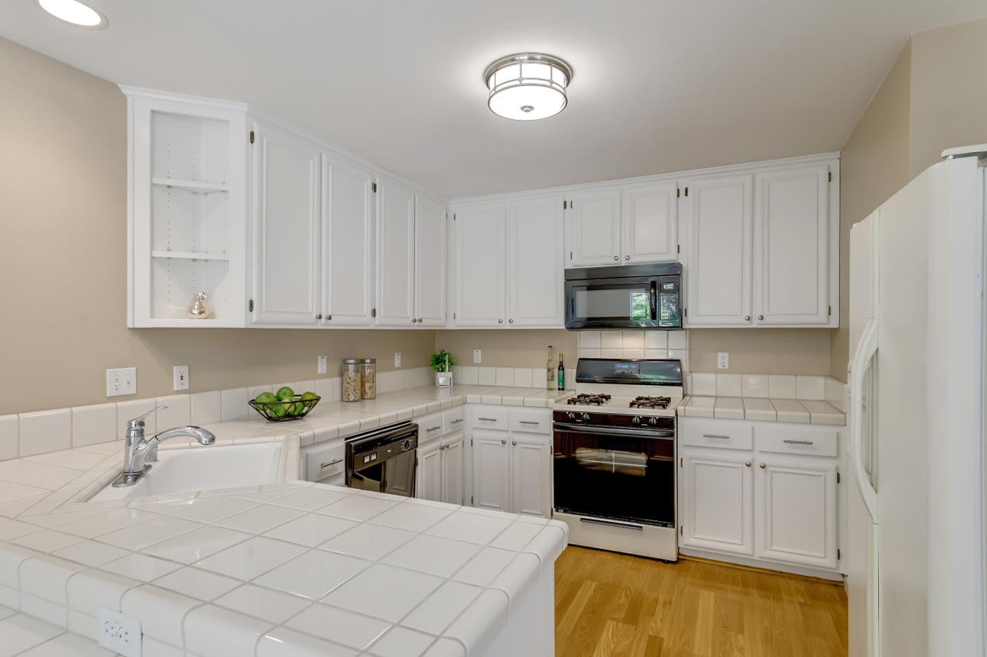 504 Weiner Way San Ramon, CA 94582 - Photo 10 of 41 a kitchen with white cabinets and appliances