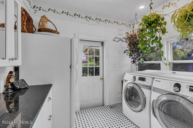116 Washington Avenue Spring Lake, NJ 07762 - Photo 12 of 26 a view of washer and dryer with kitchen in the background