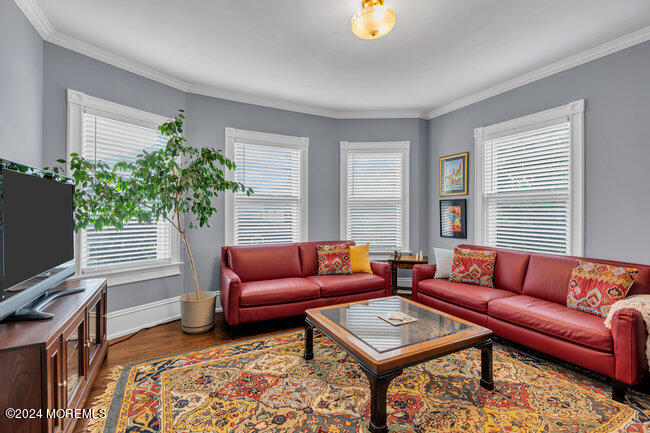 116 Washington Avenue Spring Lake, NJ 07762 - Photo 18 of 26 a living room with furniture a rug and a window