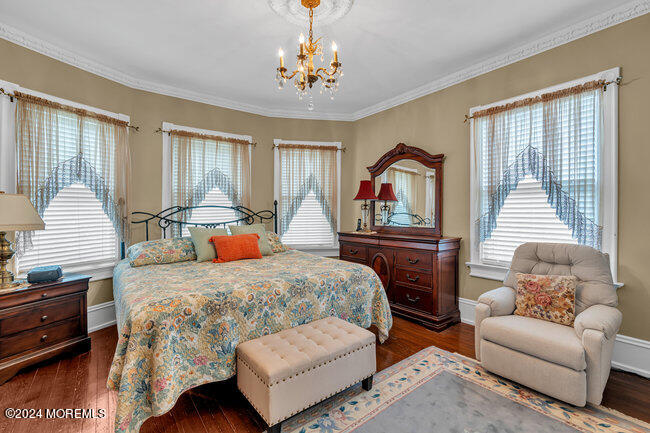 116 Washington Avenue Spring Lake, NJ 07762 - Photo 19 of 26 a bedroom with a bed and a couch
