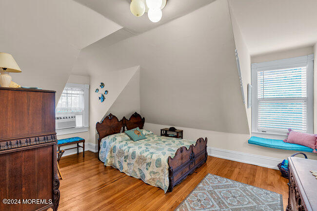 116 Washington Avenue Spring Lake, NJ 07762 - Photo 20 of 26 a bed room with a bed and a window