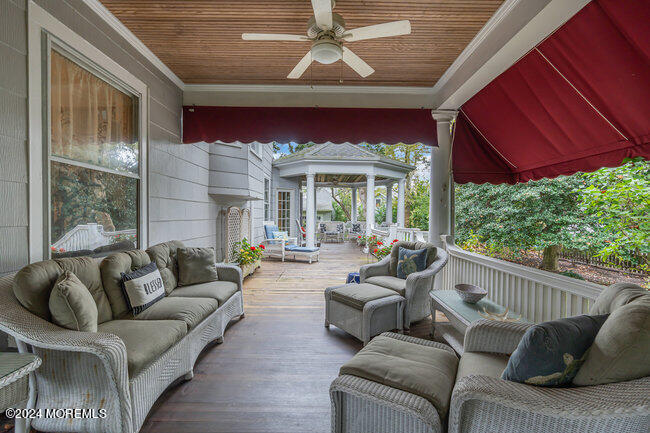 116 Washington Avenue Spring Lake, NJ 07762 - Photo 4 of 26 a living room with furniture and a large window