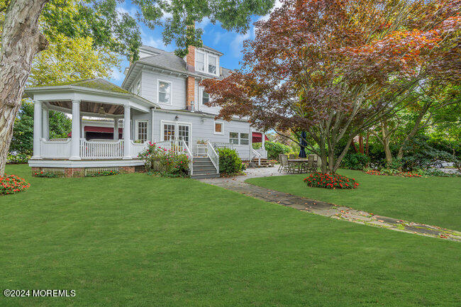 116 Washington Avenue Spring Lake, NJ 07762 - Photo 7 of 26 a view of a house with a yard