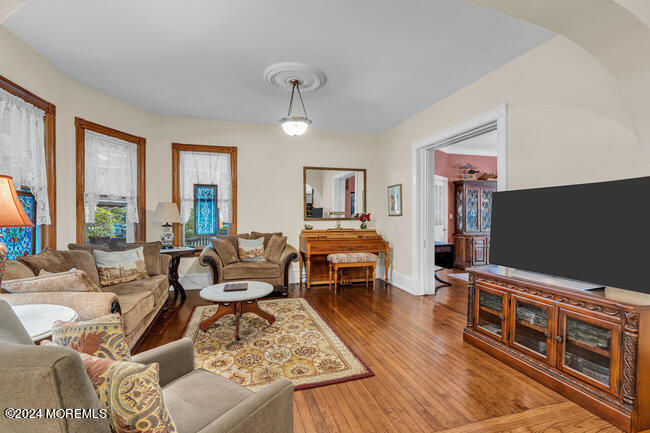 116 Washington Avenue Spring Lake, NJ 07762 - Photo 10 of 26 a living room with furniture and a flat screen tv