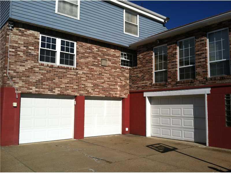 4008 Firethorn Drive McKees Rocks, PA 15136 - Photo 22 of 22 Parking Lot/Garage. THREE CAR GARAGE**PLUS SPACE FOR WORK AREA