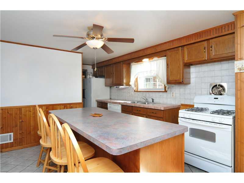 4008 Firethorn Drive McKees Rocks, PA 15136 - Photo 5 of 22 Kitchen. ALL APPLIANCES STAY**NEW GAS STOVE**BUILT IN DISHWASHER**REFRIGERATOR**MICROWAVE**PANTRY