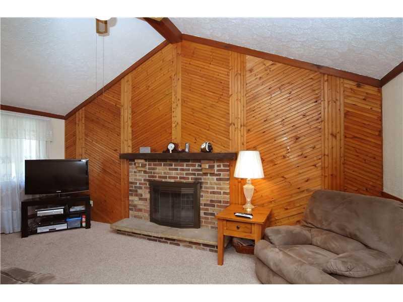 4008 Firethorn Drive McKees Rocks, PA 15136 - Photo 8 of 22 Den. 1ST FLOOR DEN, VAULTED CEILING, GAS FIREPLACE