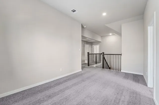 an entryway of a room with stairs