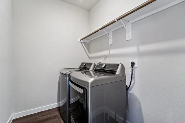 a utility room with dryer and washer