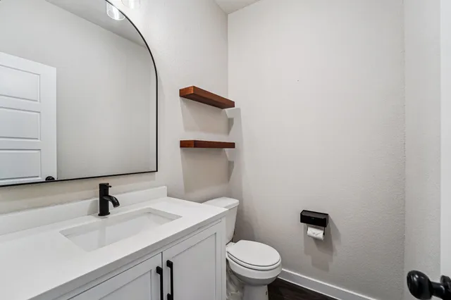 a bathroom with a sink and a toilet