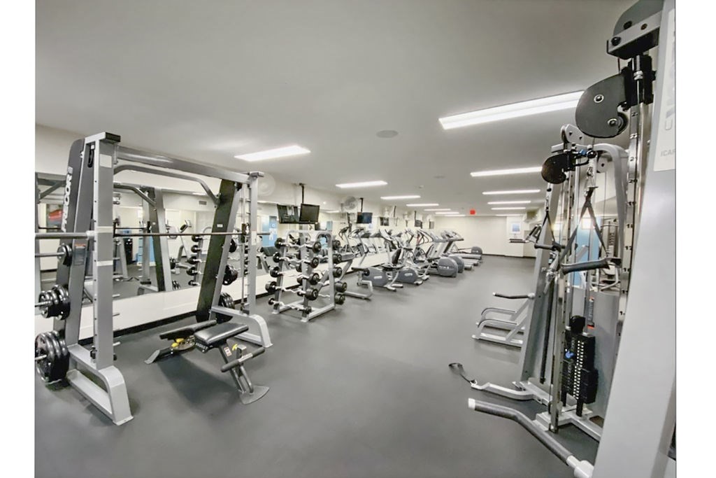 20 Chapel Street, Unit B712 Brookline, MA 02446 - Photo 19 of 25 a view of a room with gym equipment