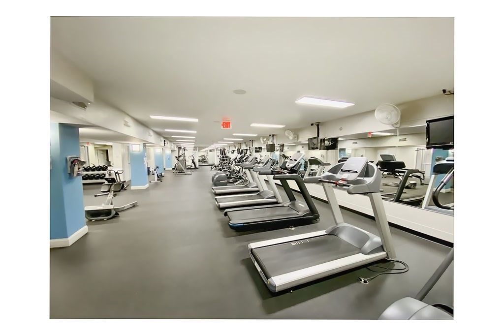 20 Chapel Street, Unit B712 Brookline, MA 02446 - Photo 20 of 25 a view of a room with gym equipment