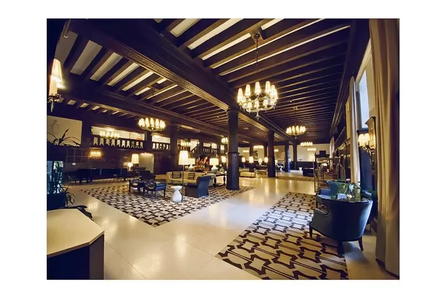 a picture of a living room with a rug