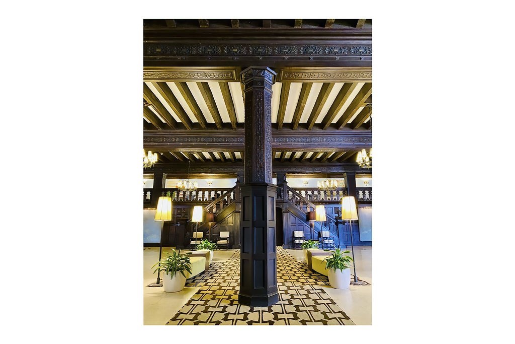 20 Chapel Street, Unit B712 Brookline, MA 02446 - Photo 22 of 25 a picture of a bench in front of building