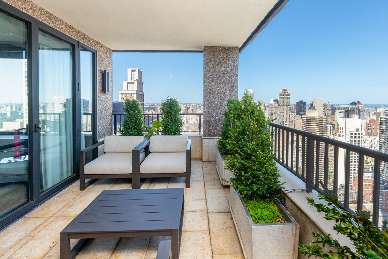 117 East 57th Street, Unit 49D/51D Manhattan, NY 10022 - Photo 29 of 46 a view of a balcony with chairs