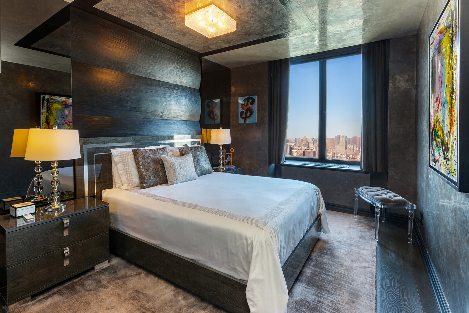 117 East 57th Street, Unit 49D/51D Manhattan, NY 10022 - Photo 31 of 46 a bedroom with a bed and window