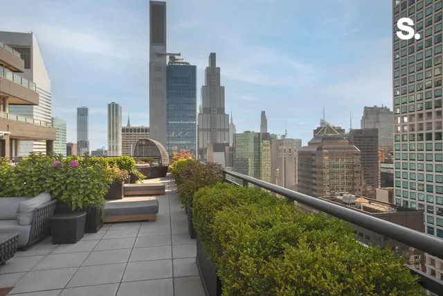 a view of a city with tall buildings