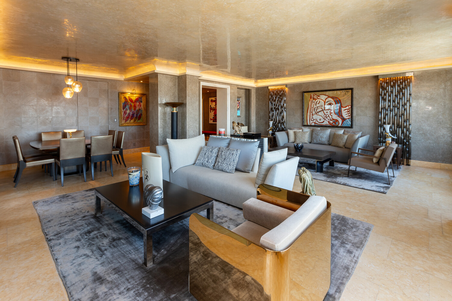 117 East 57th Street, Unit 49D/51D Manhattan, NY 10022 - Photo 4 of 46 a living room with furniture a rug and a chandelier