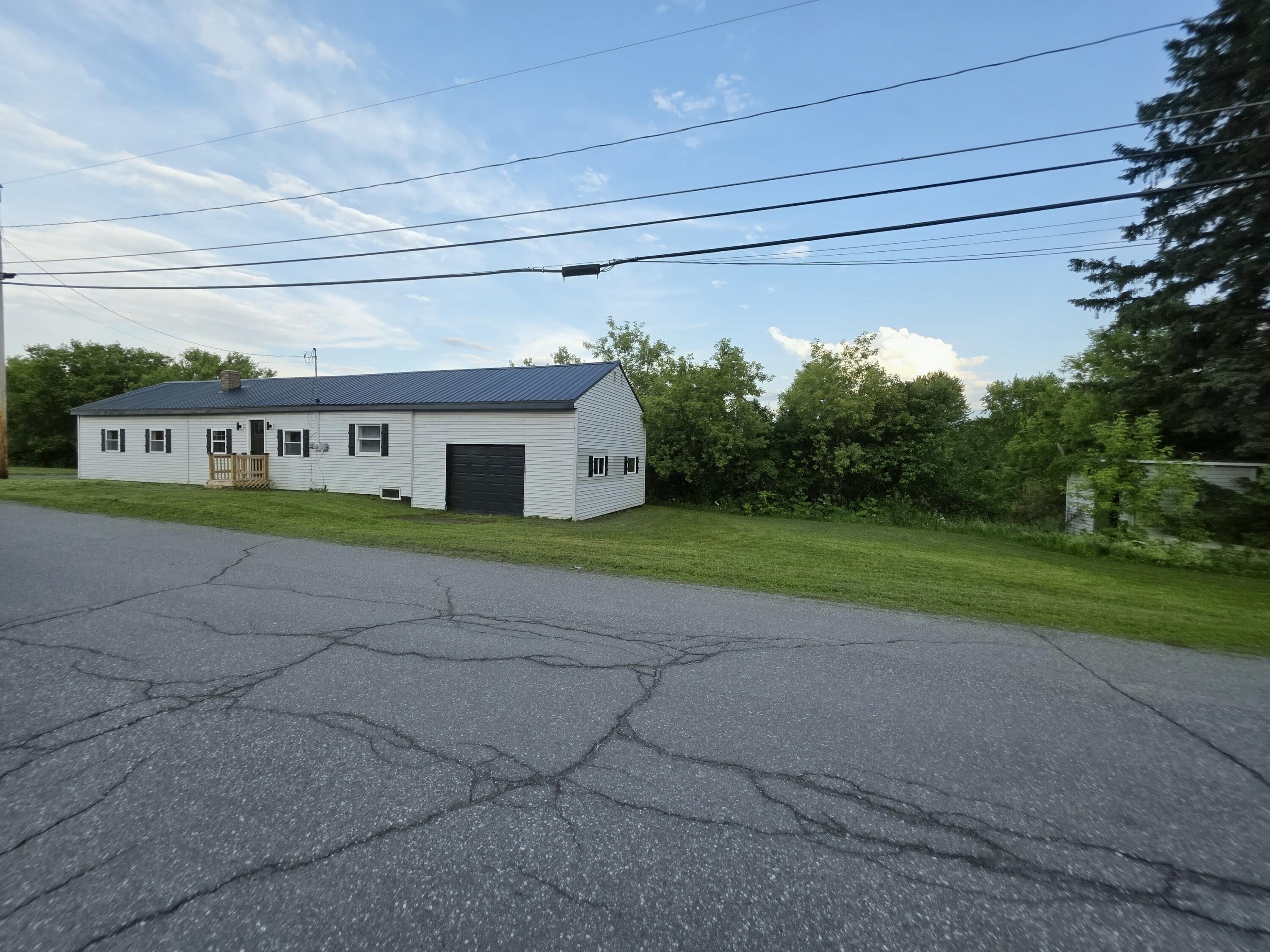 29 Exchange Street Presque Isle, ME 04769 - Photo 2 of 38 20260628_190346~2