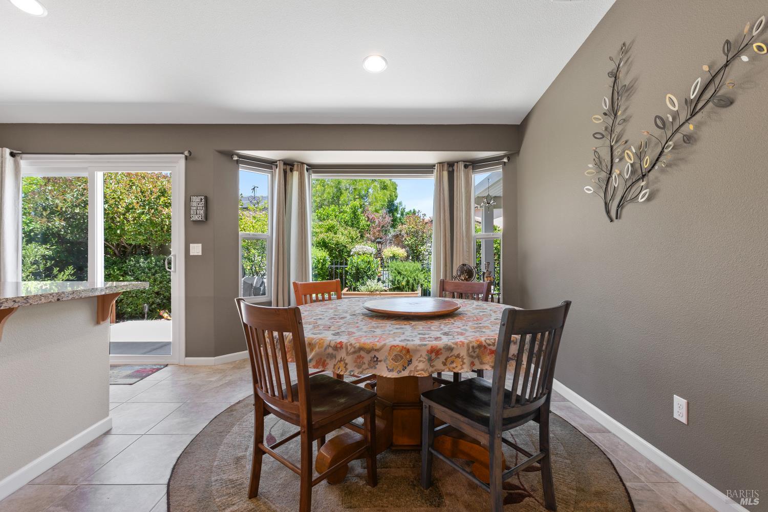 412 Spring Creek Drive Rio Vista, CA 94571 - Photo 17 of 42 a view of a dining room with furniture window and outside view