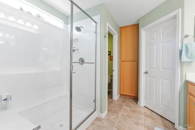 a view of a bathroom with shower