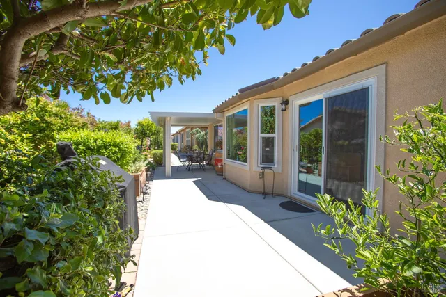 a house with flowers in front of it