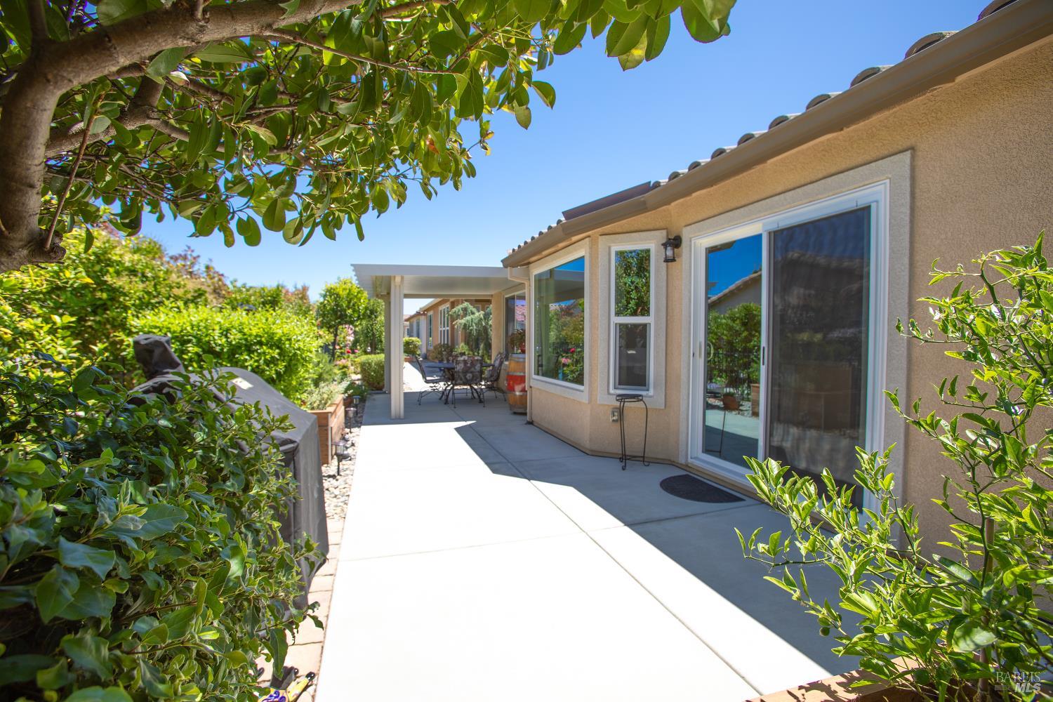 412 Spring Creek Drive Rio Vista, CA 94571 - Photo 35 of 42 a house with flowers in front of it