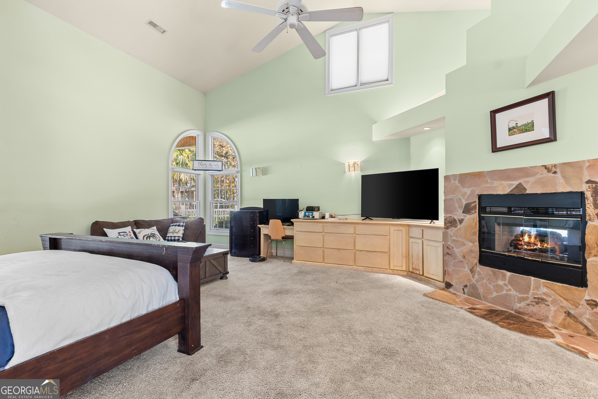 593 Cross Creek Drive Toccoa, GA 30577 - Photo 18 of 55 a living room with furniture a flat screen tv and a fireplace