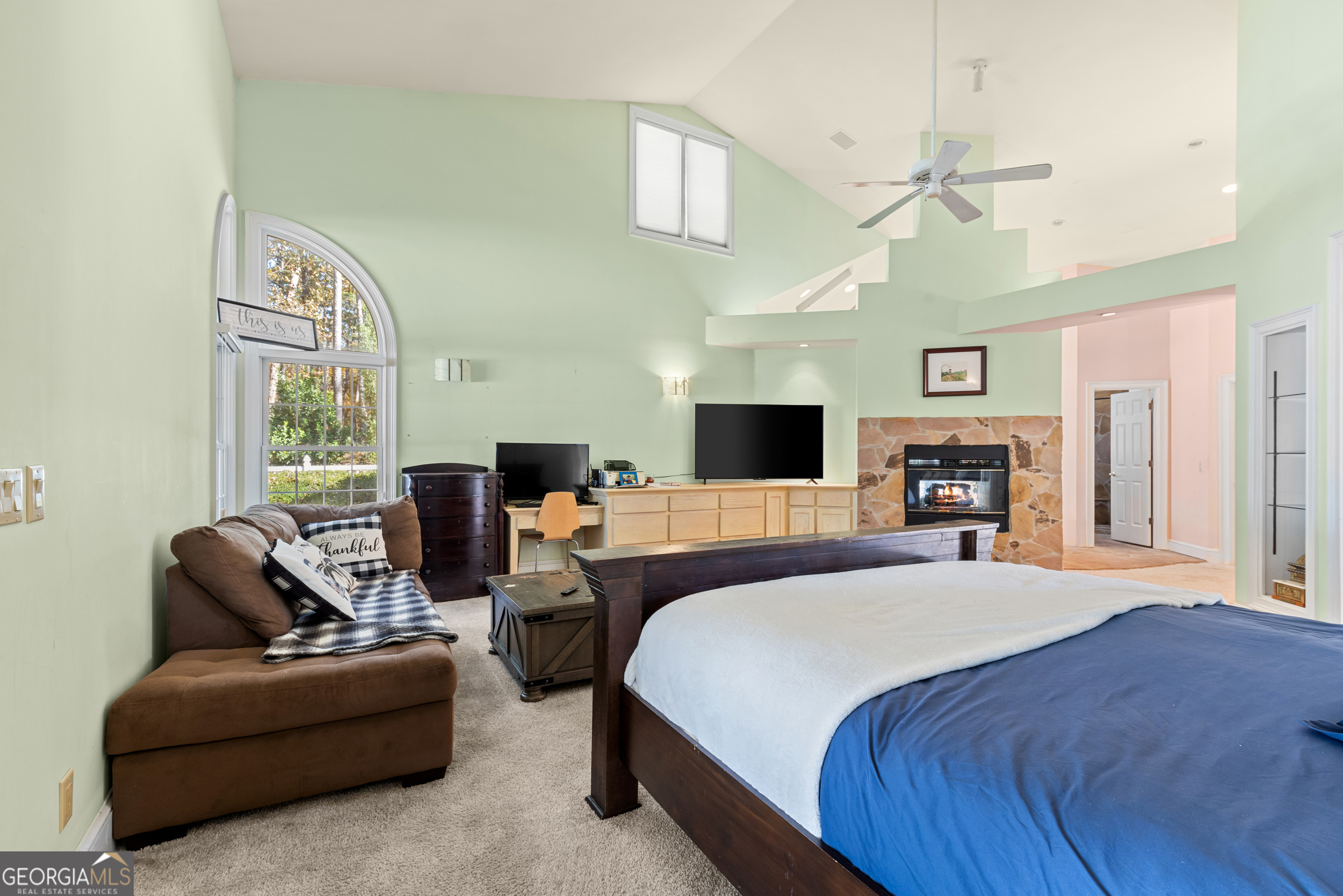 593 Cross Creek Drive Toccoa, GA 30577 - Photo 20 of 55 a bedroom with a bed a couch and dresser