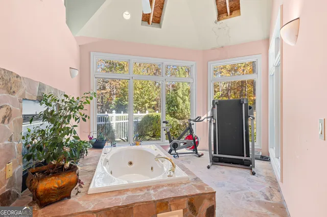 a kitchen with a sink cabinets and appliances