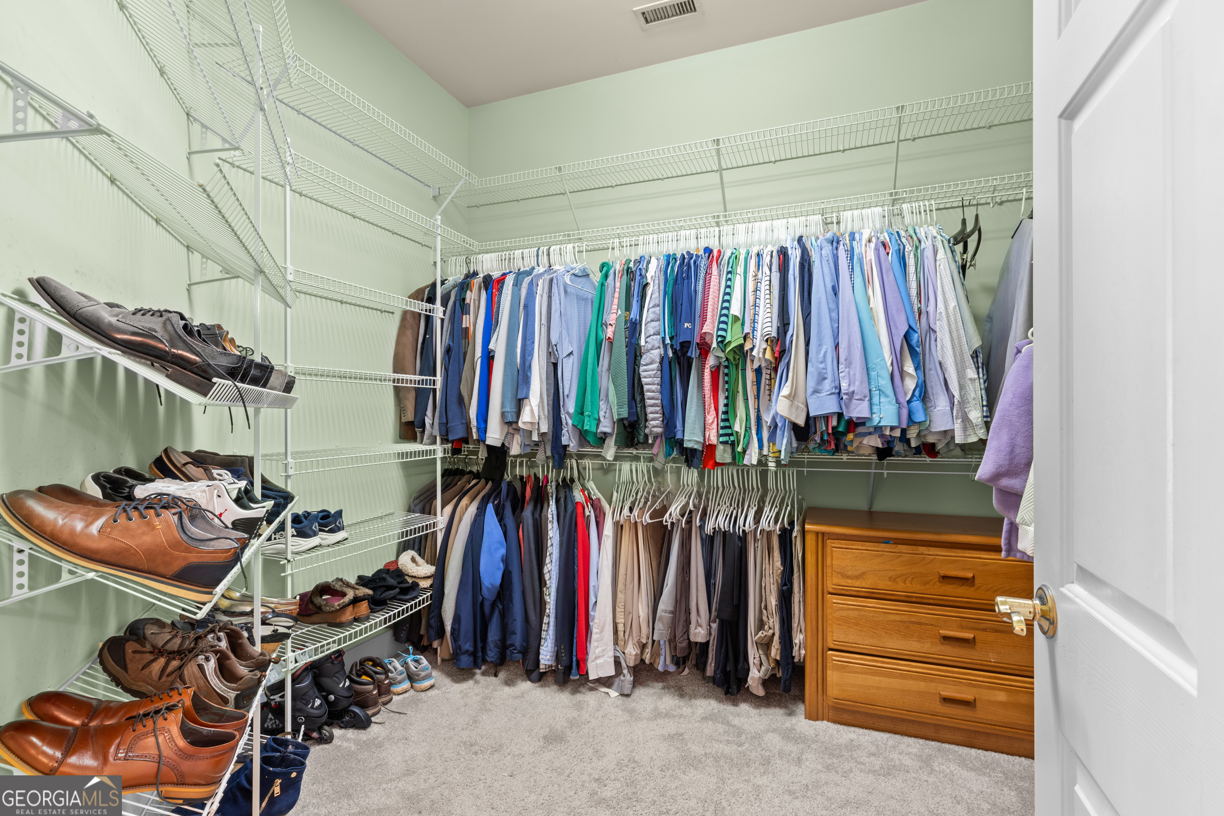593 Cross Creek Drive Toccoa, GA 30577 - Photo 24 of 55 a view of walk in closet with clothes