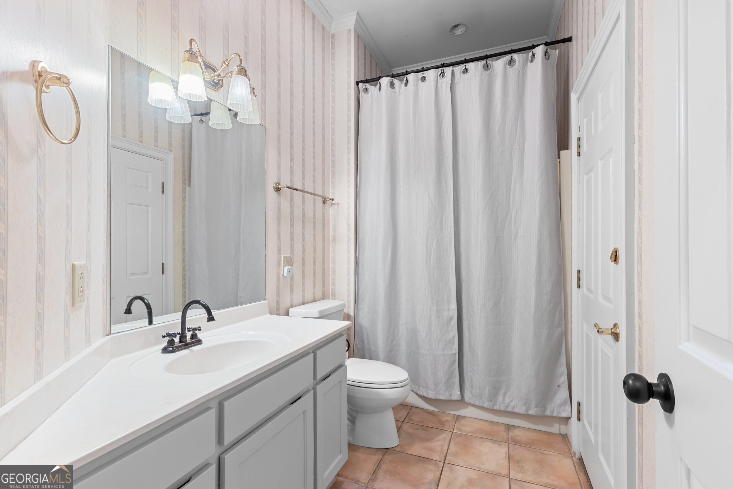 593 Cross Creek Drive Toccoa, GA 30577 - Photo 26 of 55 a bathroom with a granite countertop sink a toilet and a mirror