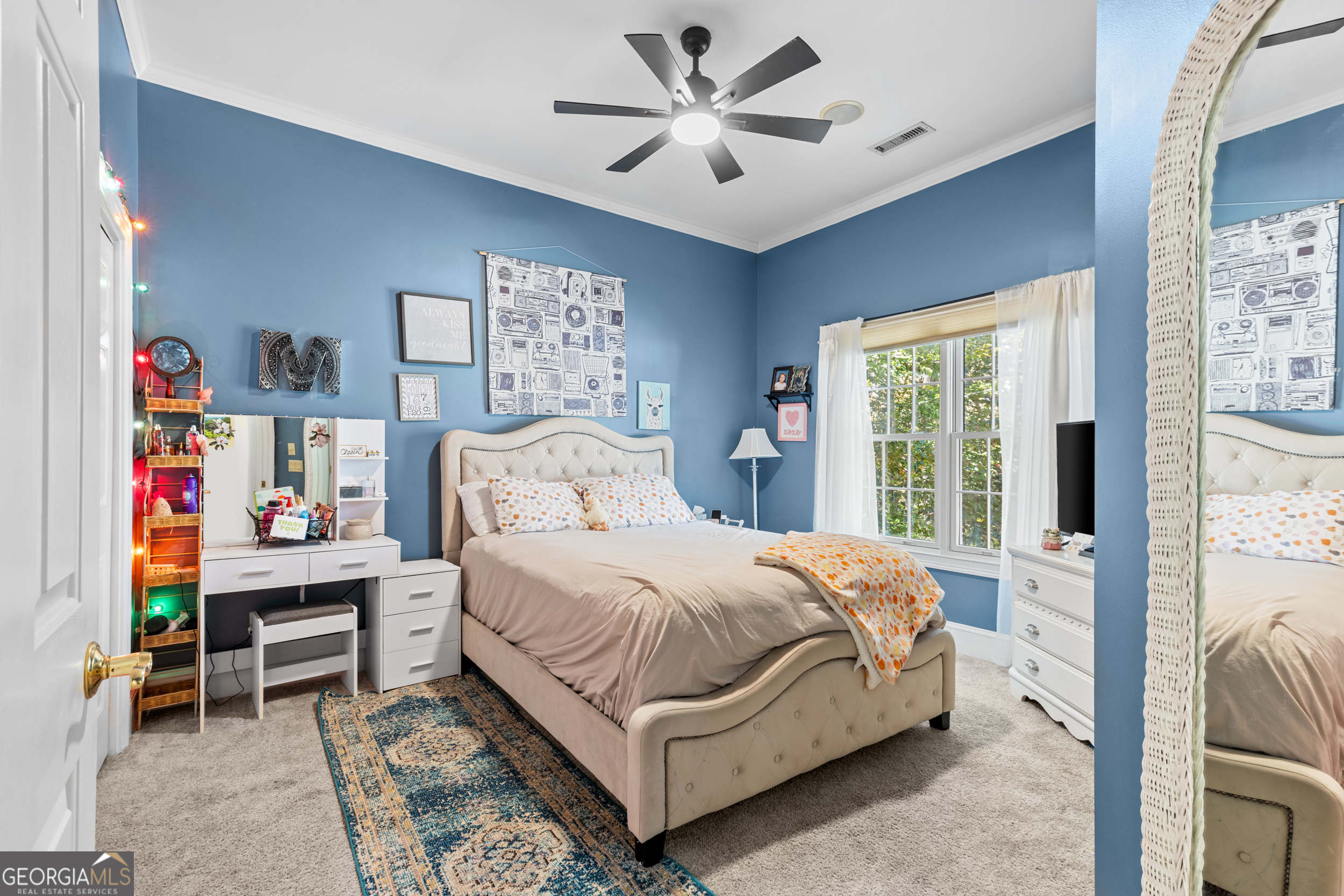 593 Cross Creek Drive Toccoa, GA 30577 - Photo 27 of 55 a bedroom with a bed and a chandelier