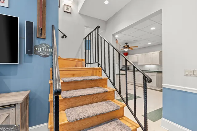 a bathroom with a sink a mirror and a toilet