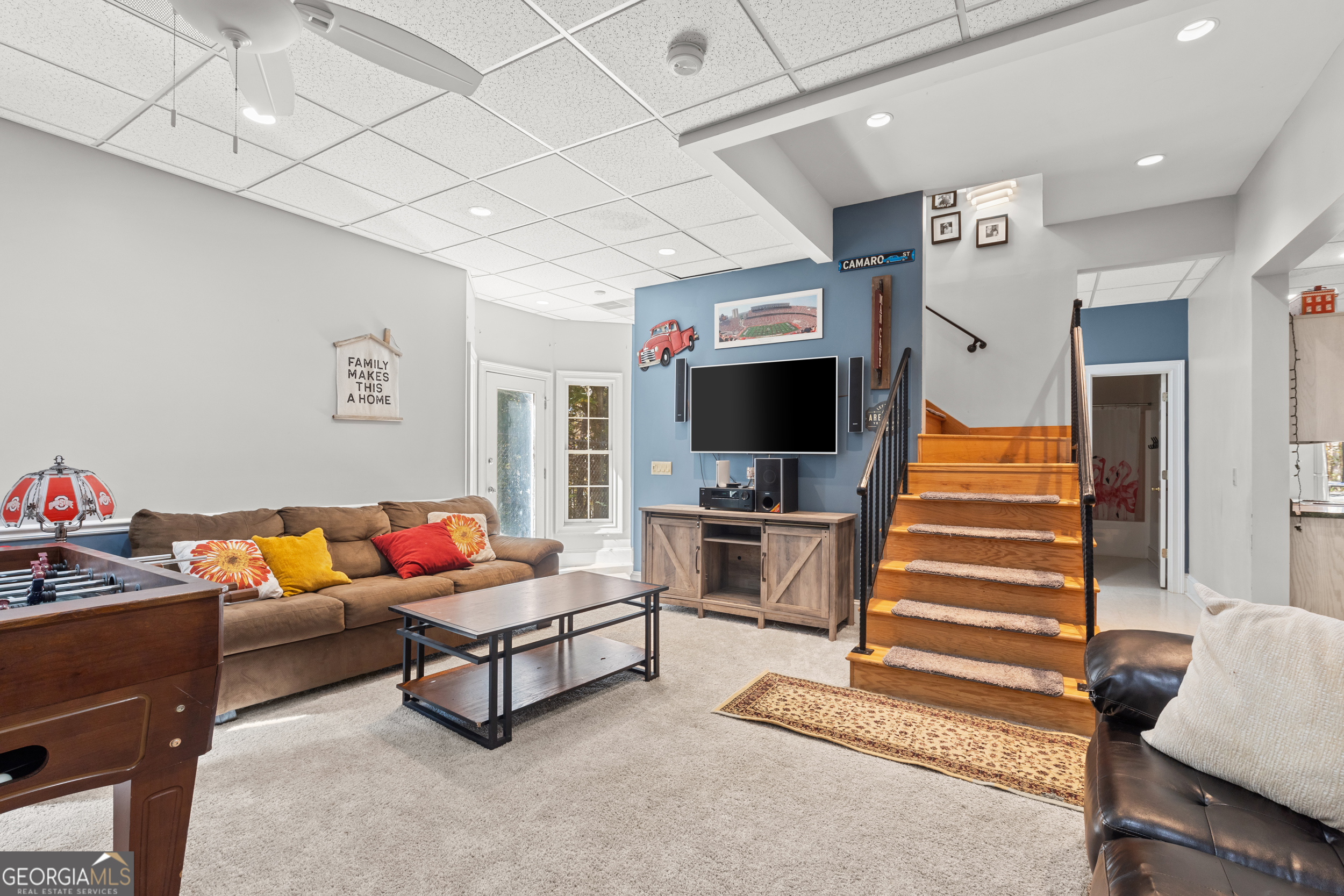 593 Cross Creek Drive Toccoa, GA 30577 - Photo 34 of 55 a living room with furniture and a flat screen tv
