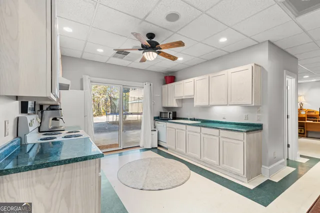 a bathroom with a sink and toilet