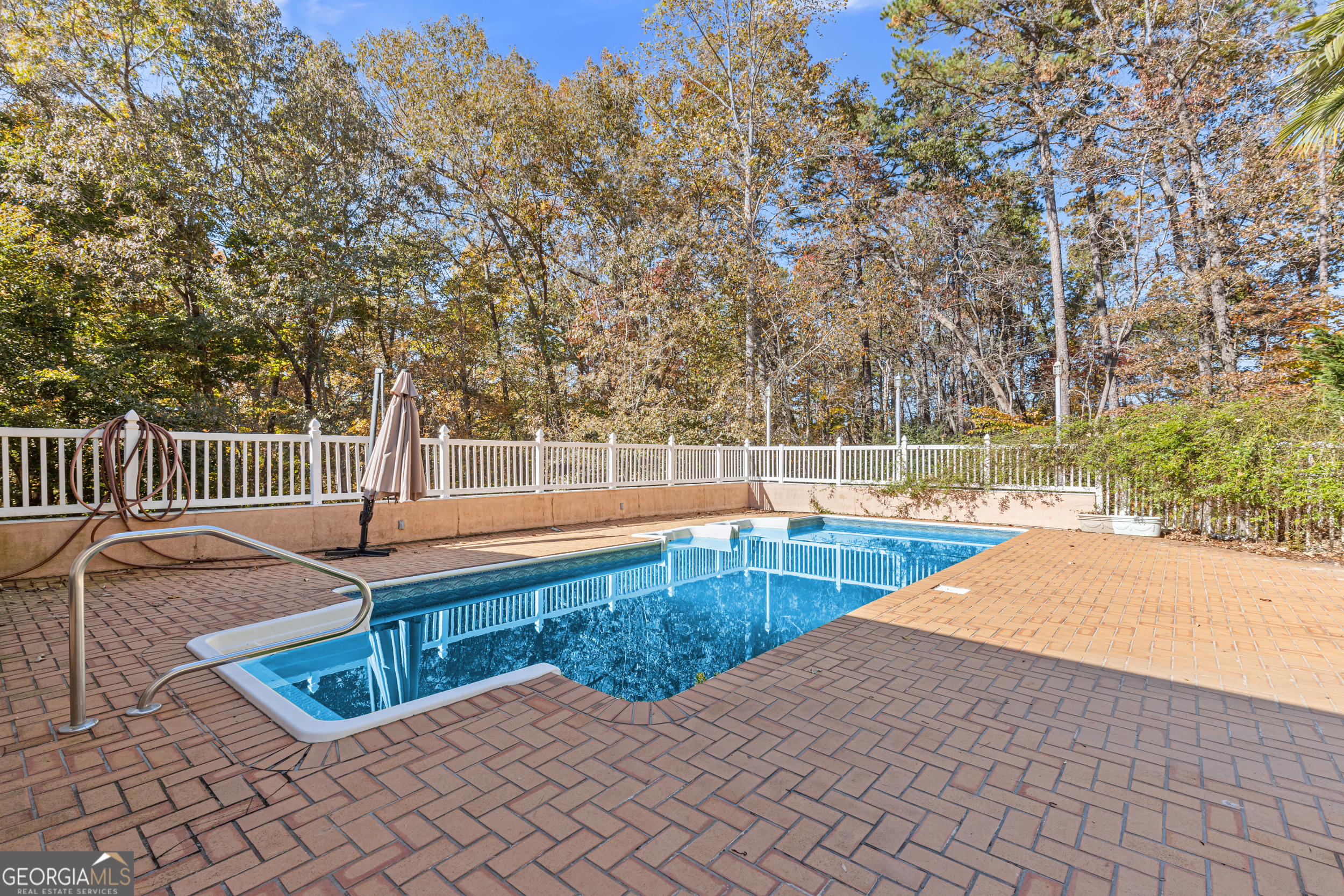 593 Cross Creek Drive Toccoa, GA 30577 - Photo 47 of 55 a view of a backyard with couches and wooden fence